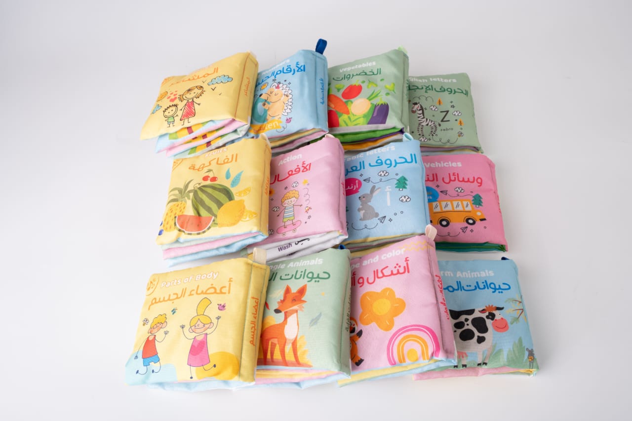 مجموعة كتب قماشية تعليمية ثنائية اللغة للأطفال 12 كتاب لتنمية الحواس والتعلم المبكر مجموعة كتب قماشية تعليمية ثنائية اللغة للأطفال 12 كتاب لتنمية الحواس والتعلم المبكر